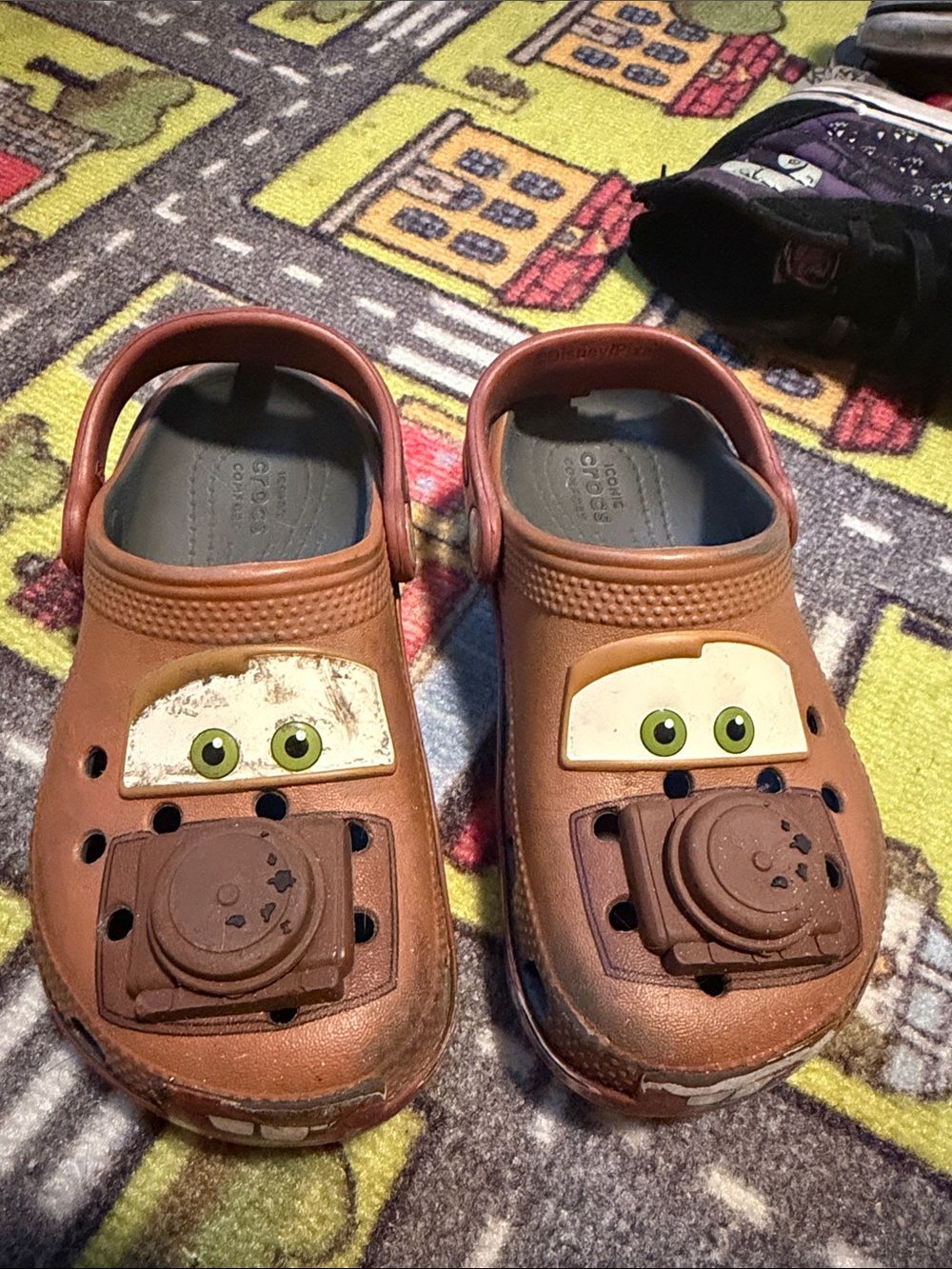 CROCS Kids Brown Character Clogs with Green Eyes